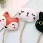 Campana con plumas para gato